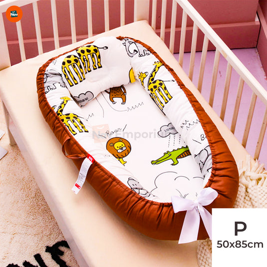 Baby with BionicCot comforter toy