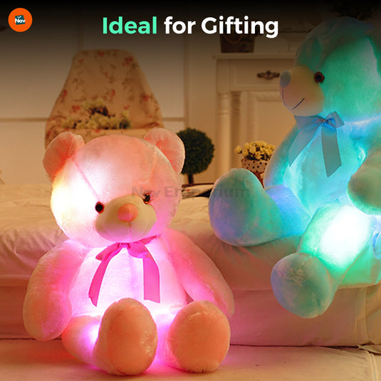 Happy child hugging GlowBear LED teddy -9