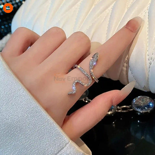 Snake ring worn on woman's finger