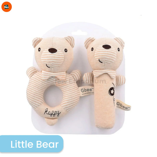 Teething baby chewing cloth rattle