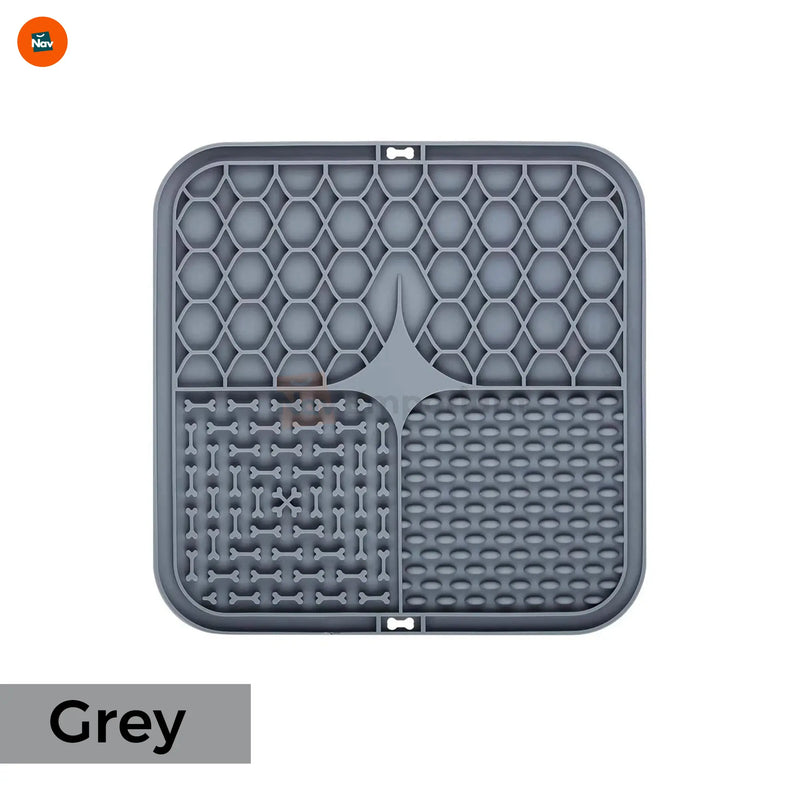 Pet enjoying slow feeder mat