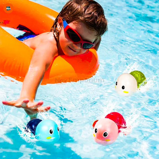 Toddler Playing with Wind-Up Tortoise