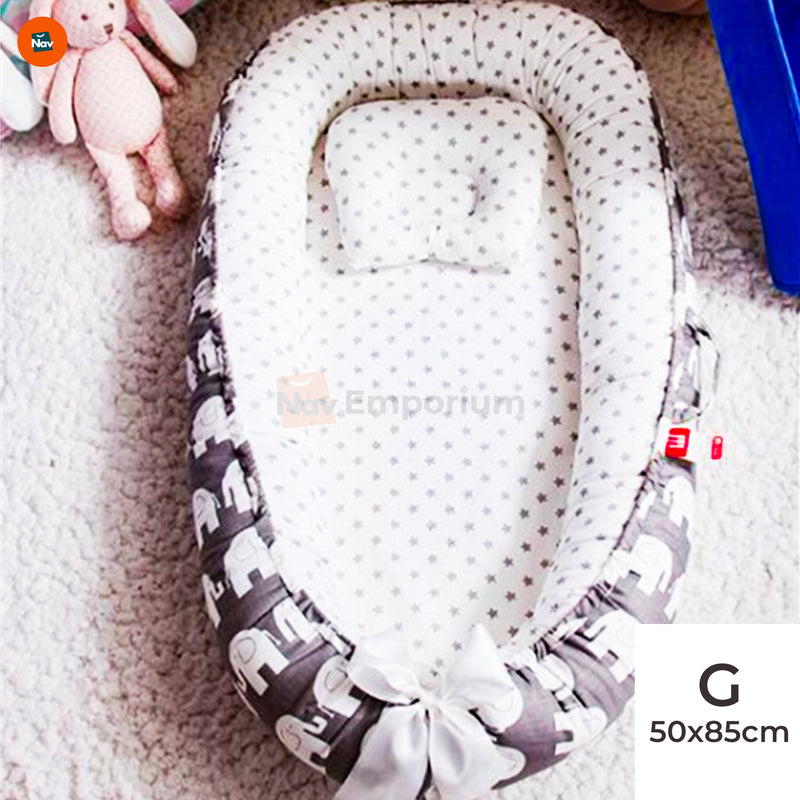 Infant sleeping in BionicCot Lounge 
