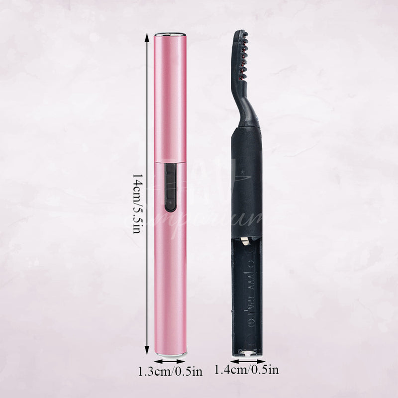 Heated eyelash curler in use