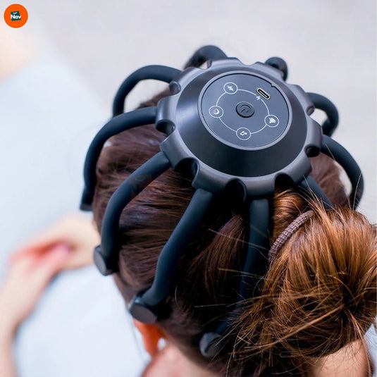 Lifestyle image person using head massager at desk 